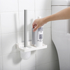 Escobilla de baño montada en la pared con estante de almacenamiento